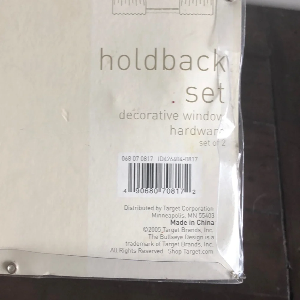 Decorative window hardware holdback set